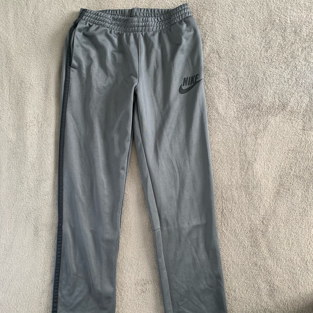 •Nike Black and Gray Track/ Running Pants. Adult Medium!
•Price- $25
